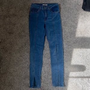 Levi’s 721 Skinny Jeans with front slit. Size 28